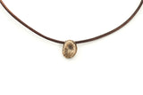 The Coffee Bean!  Bronze beach stone on leather cord with a bronze clasp.