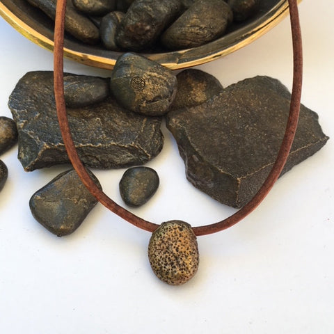 The Coffee Bean!  Bronze beach stone on leather cord with a bronze clasp.