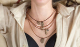 Rivited - Bronze beach stone necklace on leather cord... Our first & best selling!