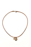 The rough one... bronze beach stone on leather cord with bronze clasp